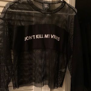 A black sheer long sleeve